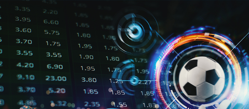 Bola com circulos coloridos em volta e painel de odds atrás